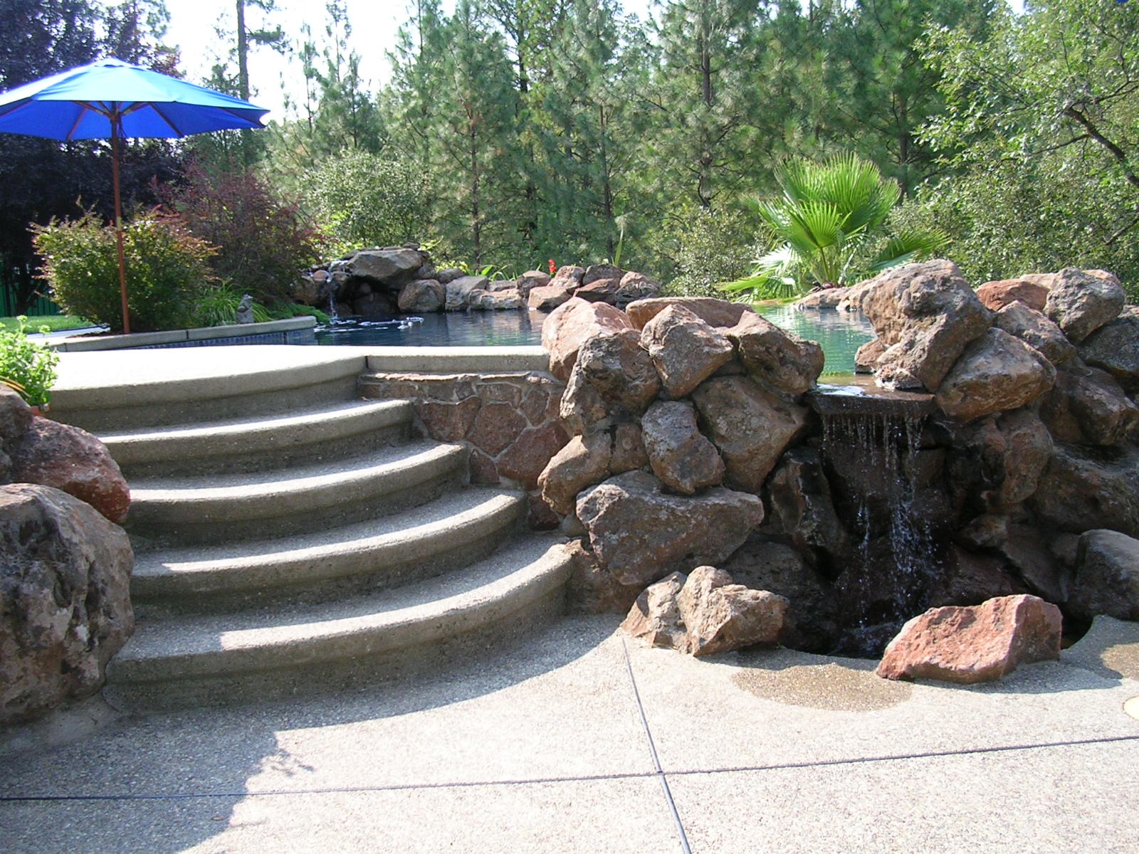 Stairs from lower patio to upper patio.