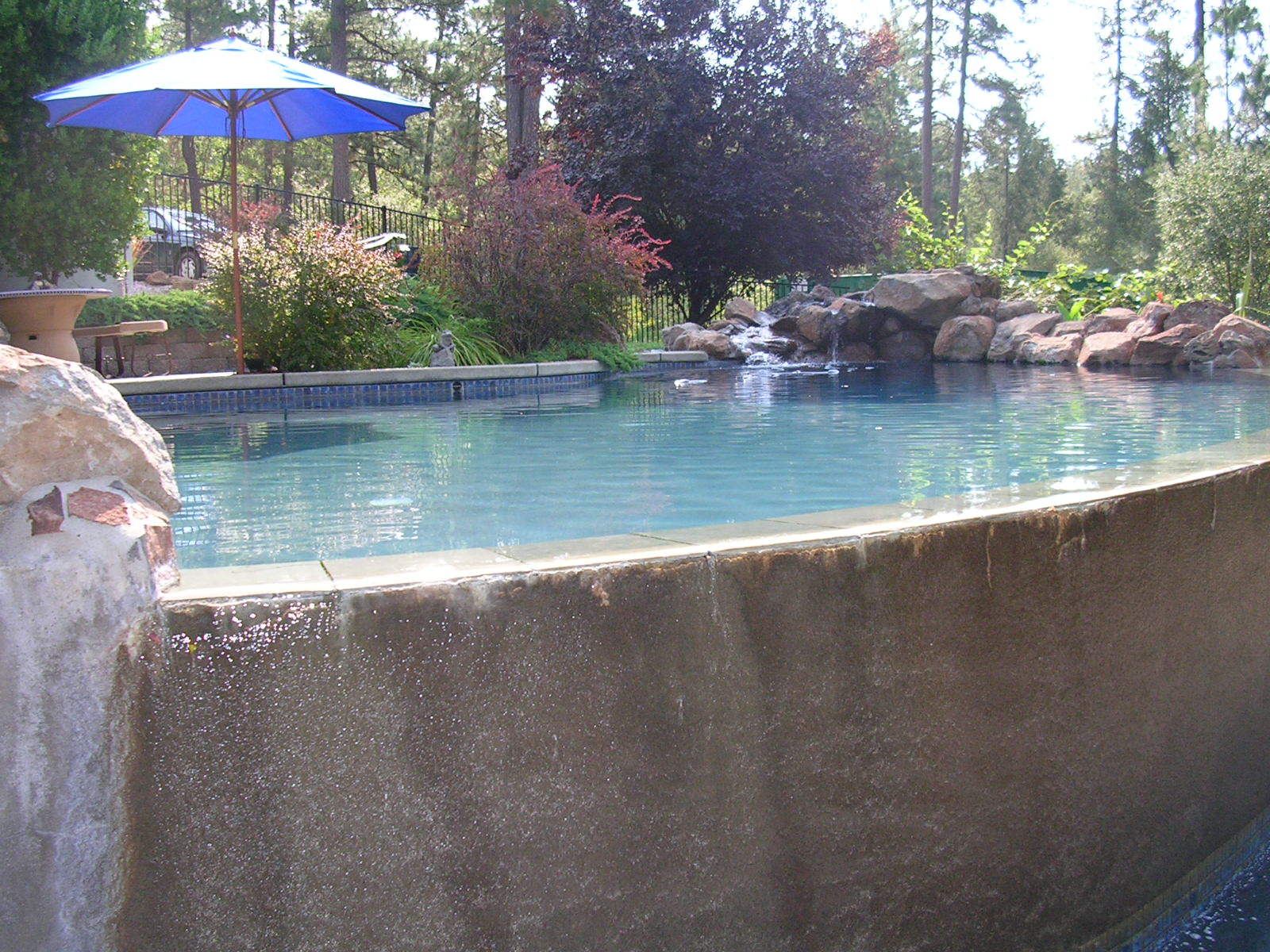 Far side of infinity pool looking back at the upper waterfall.